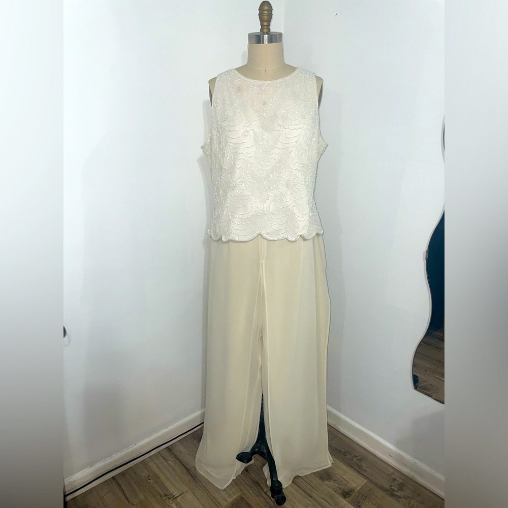 Cream two piece vintage garment. Sleeve top and wide bottoms